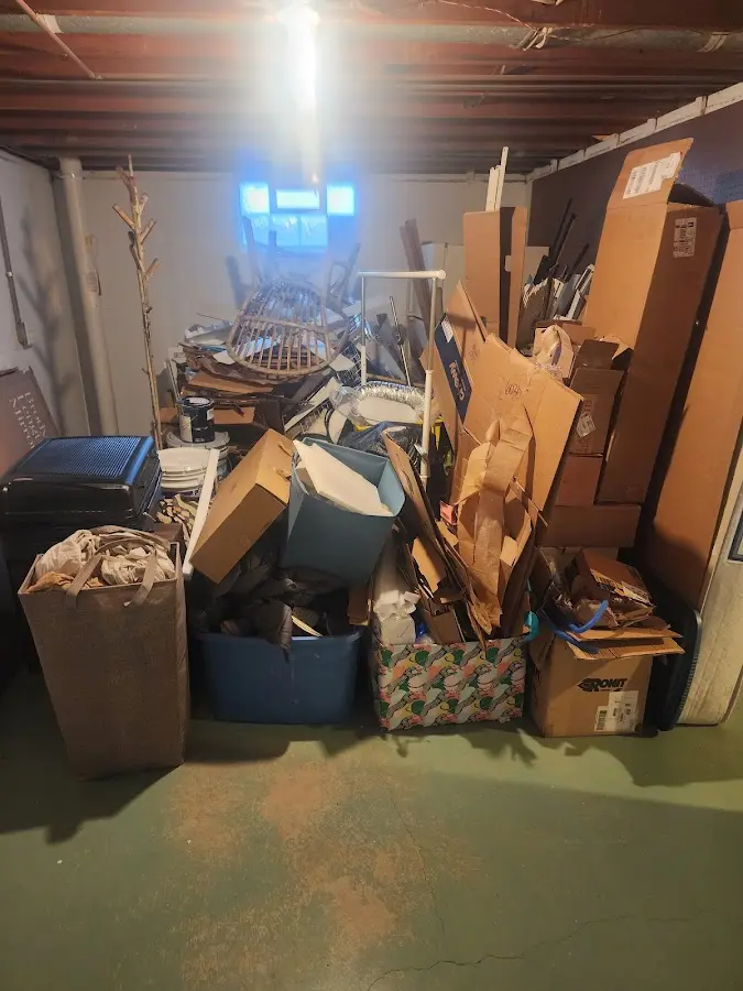 Roll-off dumpster container at job site for Yard Waste Dumpster Rental in Larned